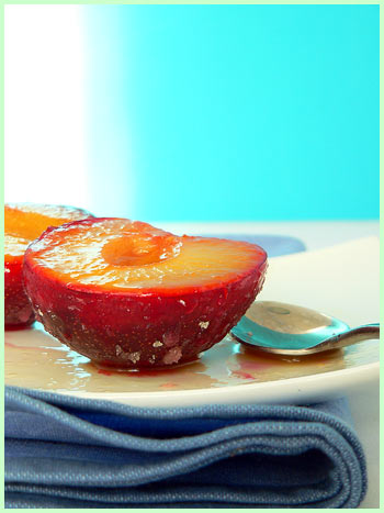 Plum with orange syrup