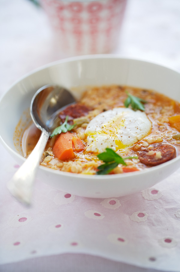 White lentil soup with chorizo and paprika cream